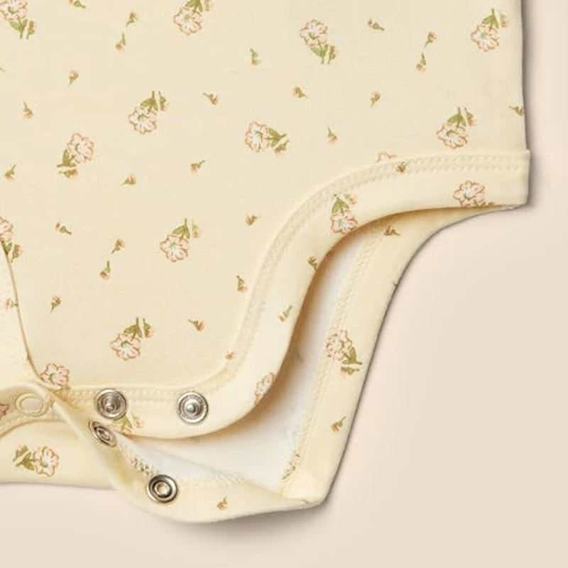 Amazon Essentials x Sofia Grainge Body con Volantes Bordados Bebé Niña, Pack de 2, Florecitas Flores/Marfil, 24 meses - Imagen 3